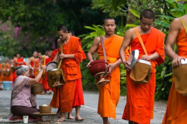 morning alms giving in luang prabang laos