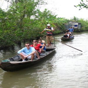 Boat trip through the canals of Mekong Delta in Ben Tre
