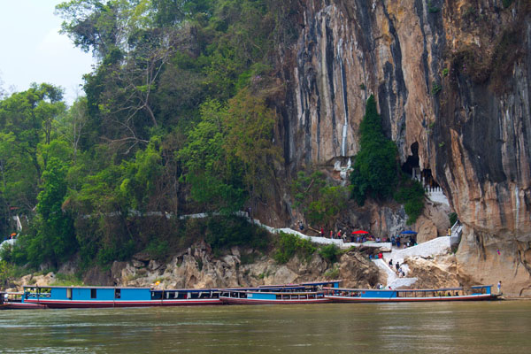 Boat trip to visit Pak Ou Caves - Indochina 21 Day Tour