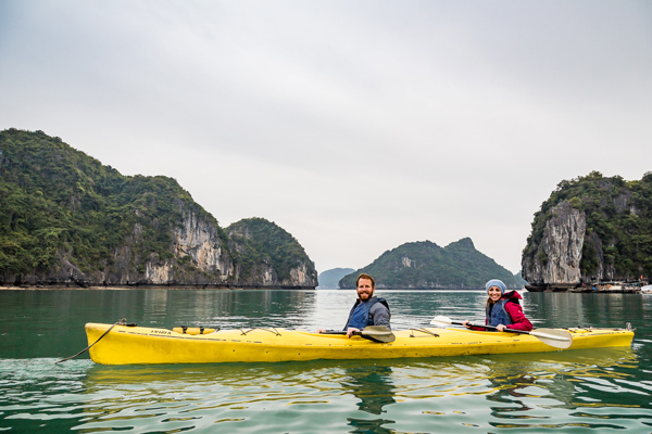 Kayaking between the majestic Halong Bay