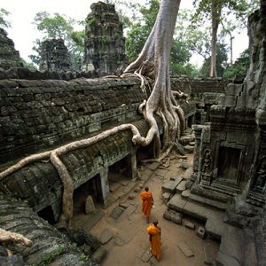 Monks walking through the Ta Prom Temple