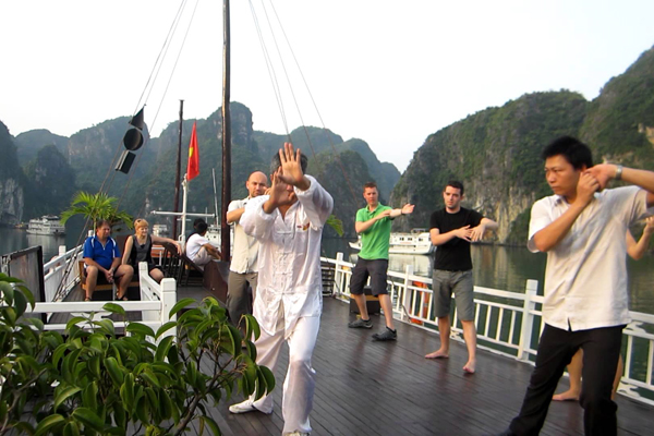 Morning Tai Chi on Cuise Halong - Indochina Trips