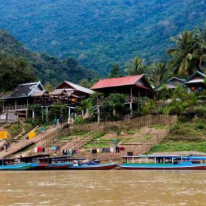 Pass through ethnic villages to get a boat trip to Muong Ngoi