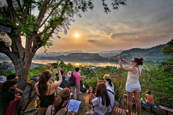 Sunset over Mount Phousi - Indochina tour packages