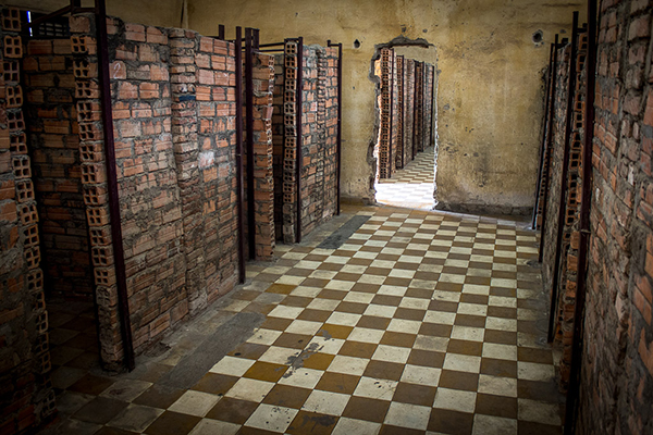 Prison cells set up in one of the room of Tuol Sleng Genocide Museum