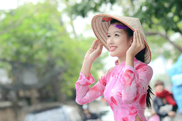 Ao Dai combined with Conical Hat