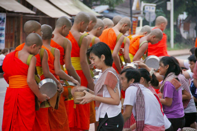 Morning Alms giving ceremony in Laos