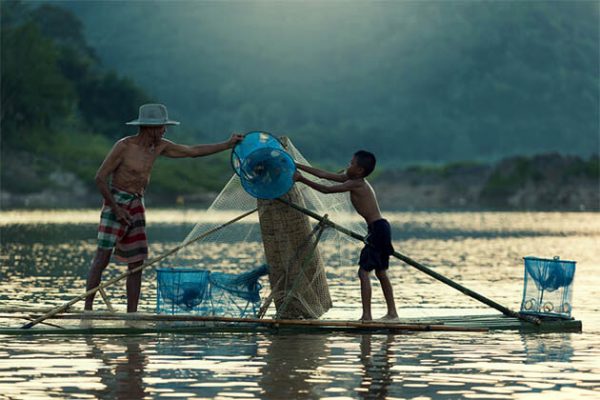 Fisherman on Mekong Delta