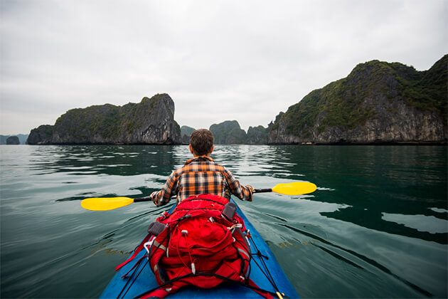 Kayaking on Halong Bay -Indochina tour packages