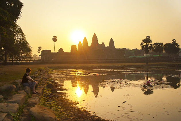 enjoy sunrise at Angkor Wat from Cambodia & Laos tours