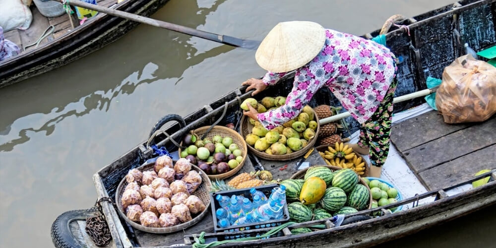 vinh long market - indochina vietnam group tours