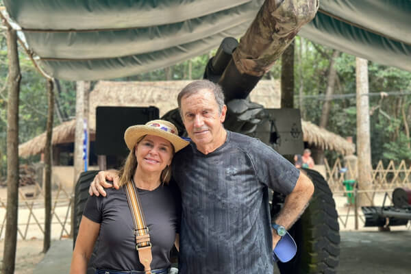 Group in Cu Chi Tunnels with Vietnam tour itinerary 12 days