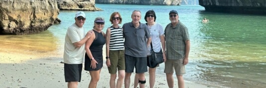 Family enjoying Sihanoukville beach on Indochina tours
